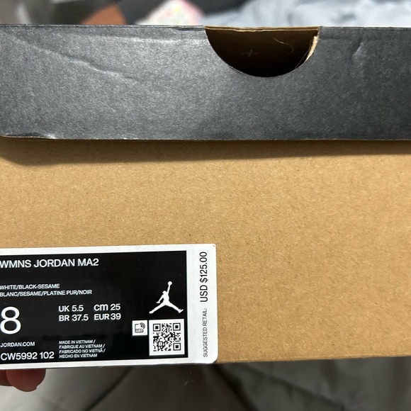 White and tan woman’s Jordan’s (jump man) life style sneaker. - Picture 4 of 4